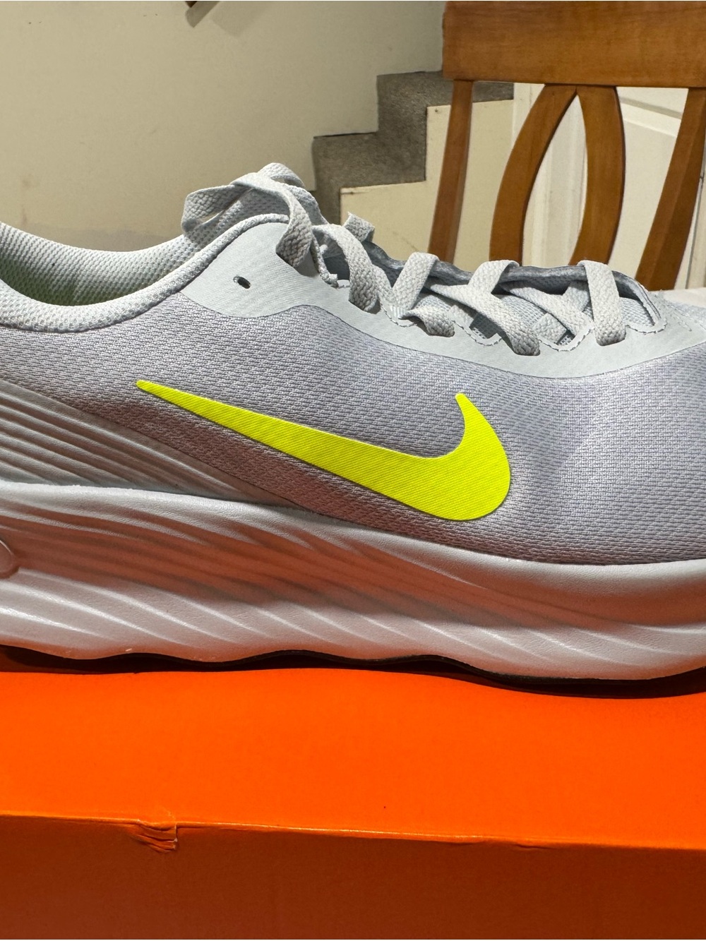Nike White Athletic Shoe with Neon Yellow Insole